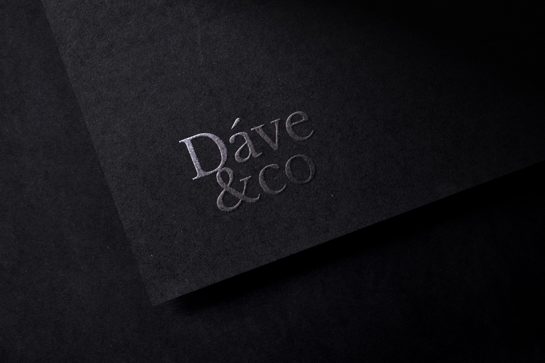 Embossed Logo Mockups on Dark Paper