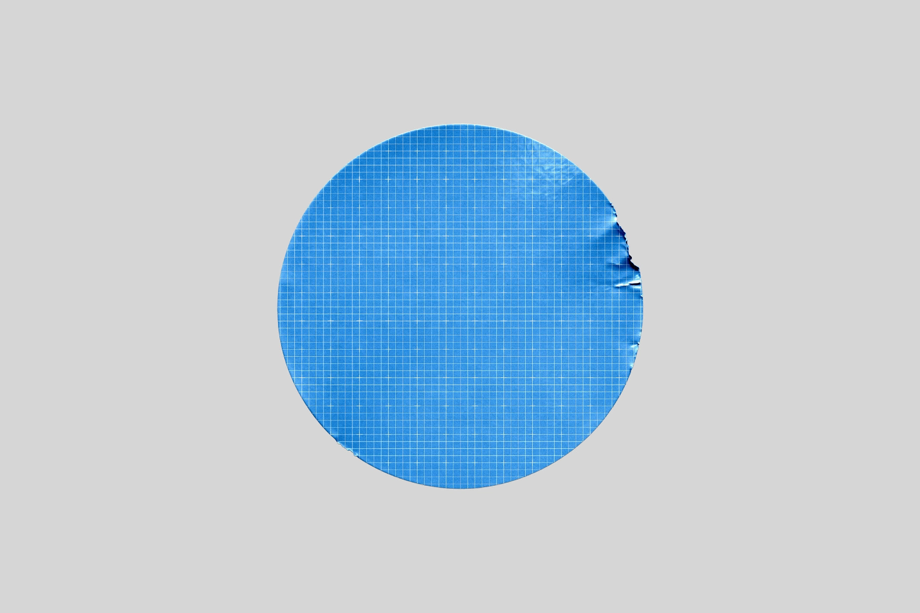 Round Sticker Mockup with Wrinkles & Edge Dent