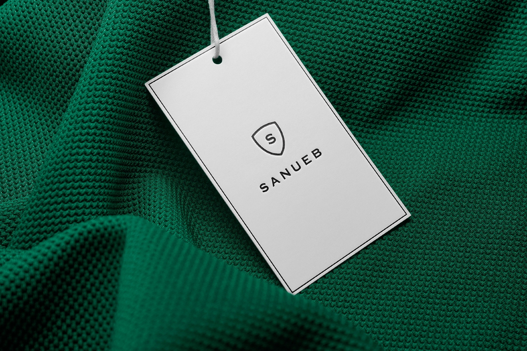Garment Tag Mockup on Textured Knit