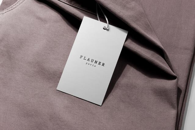 Swing Tag Mockup on Folded Tee