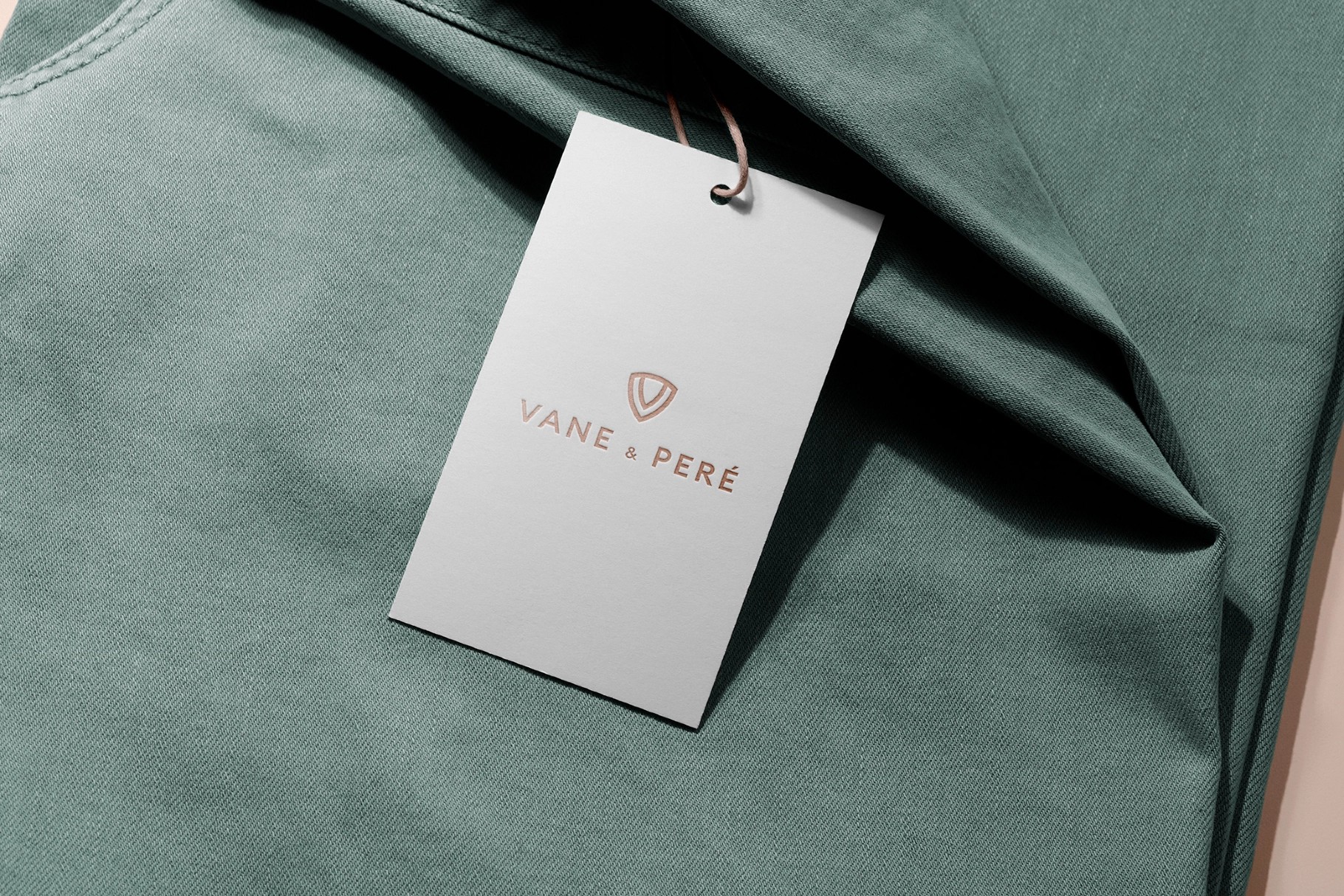 Swing Tag Mockup on Folded Tee