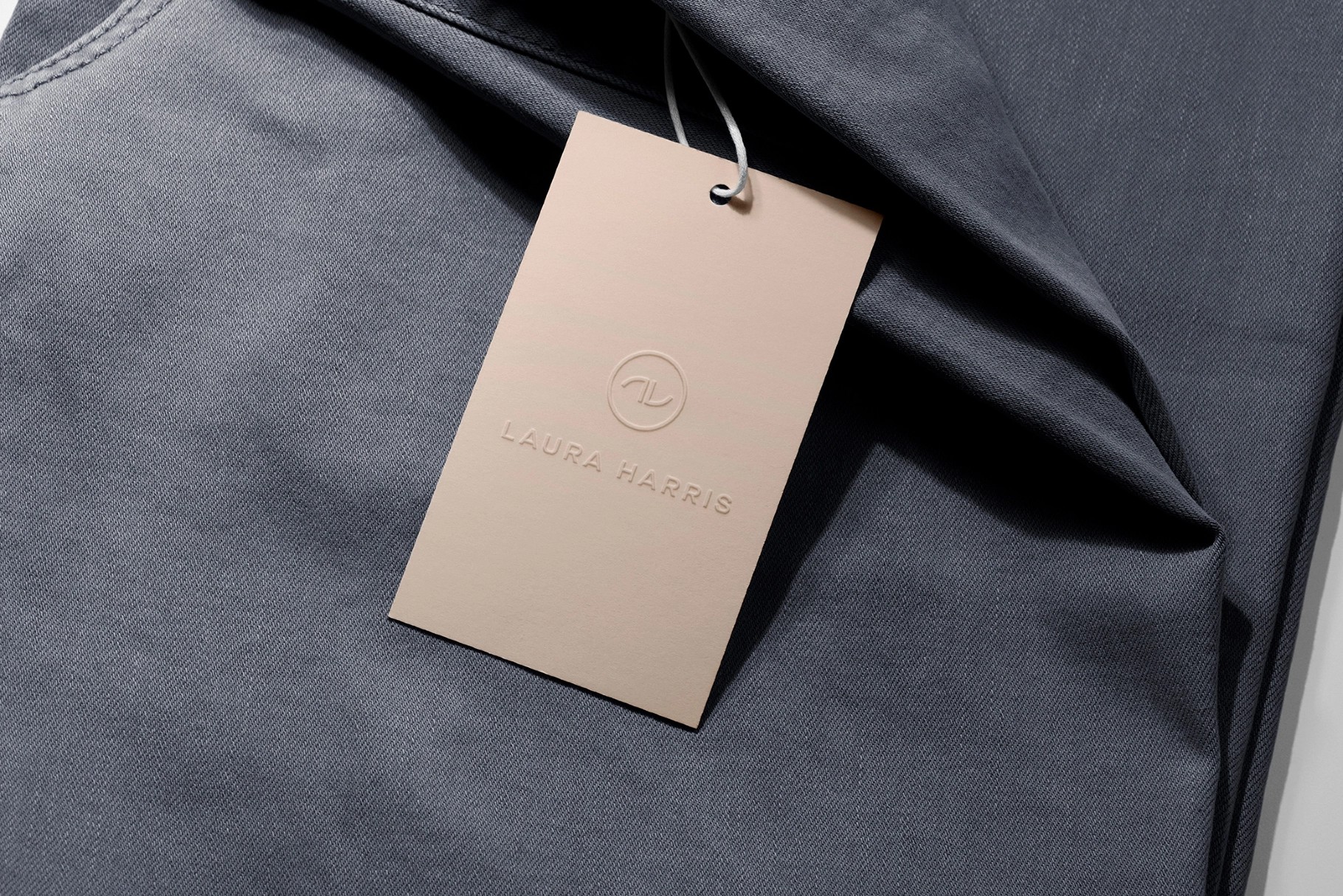 Swing Tag Mockup on Folded Tee