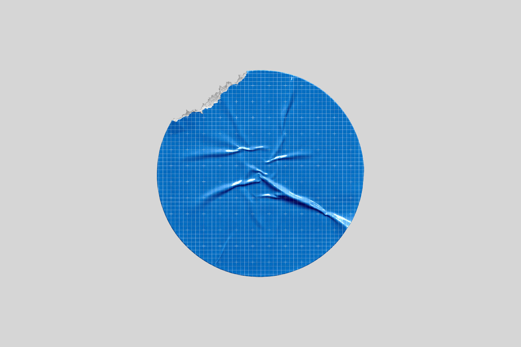 Round Sticker Mockup with Torn Bite