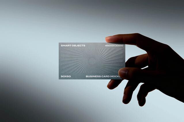 Business Card in Hand Mockup