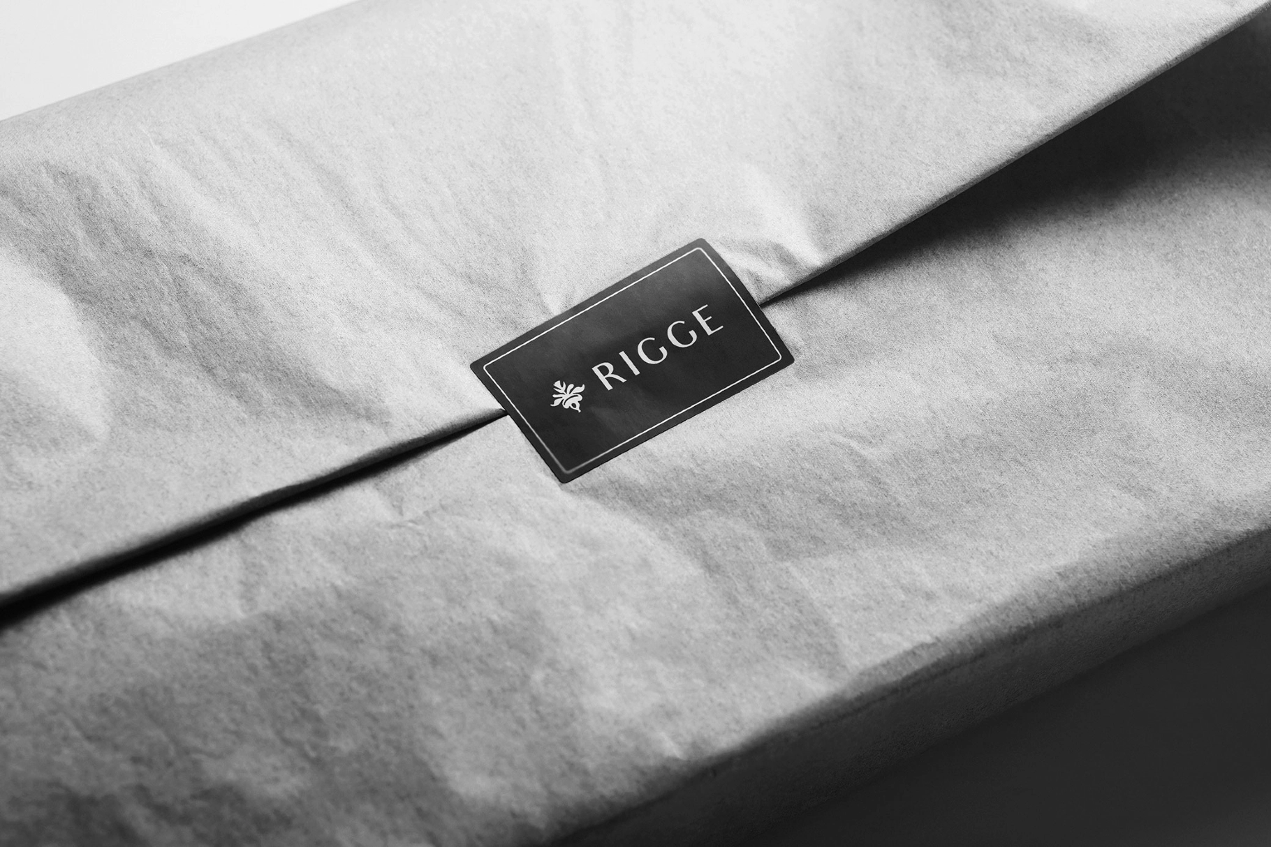 Sticker Mockup Over Folded Tissue Wrap