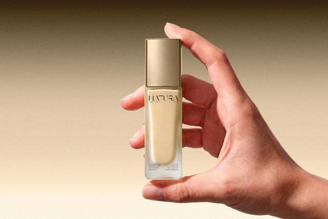 Skincare Serum Bottle Mockup in Hand