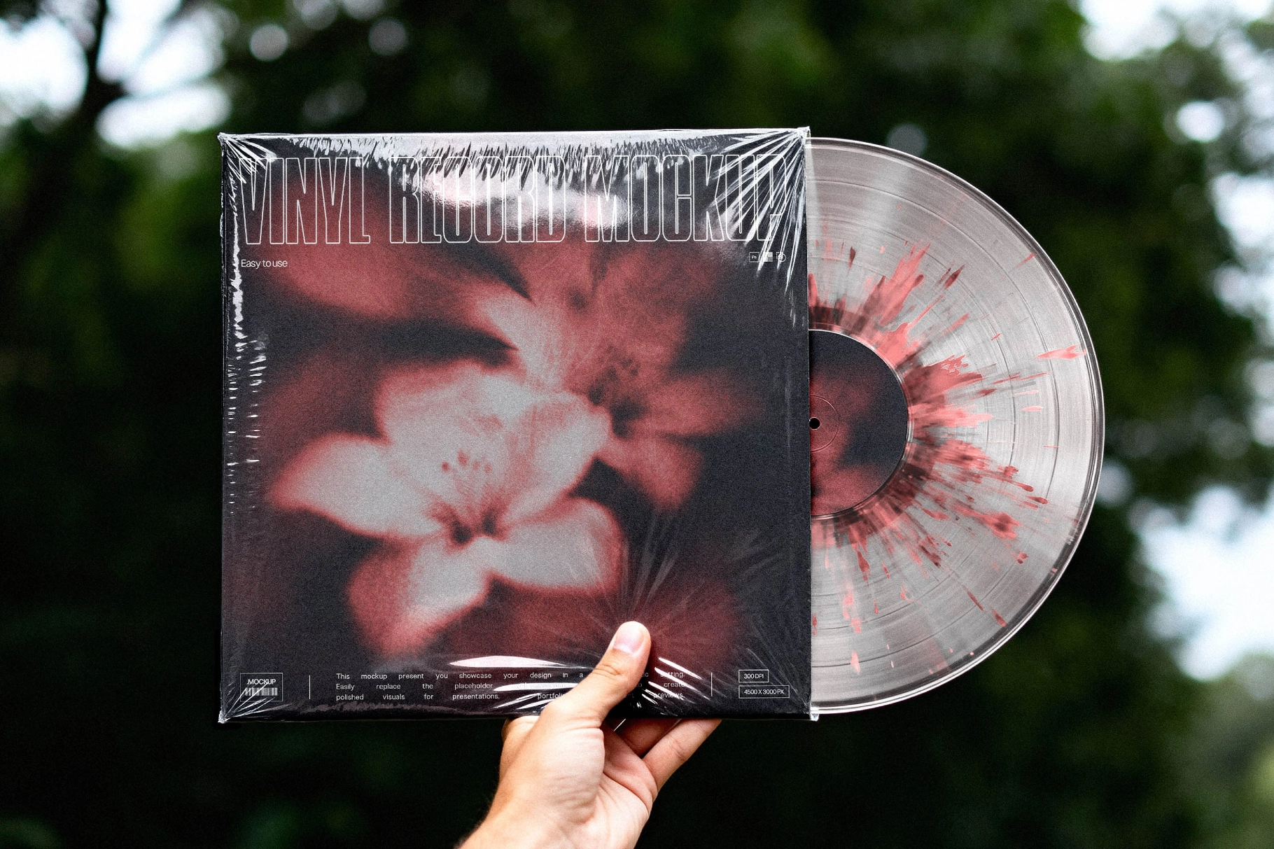 Hand Holding Vinyl Record Mockup