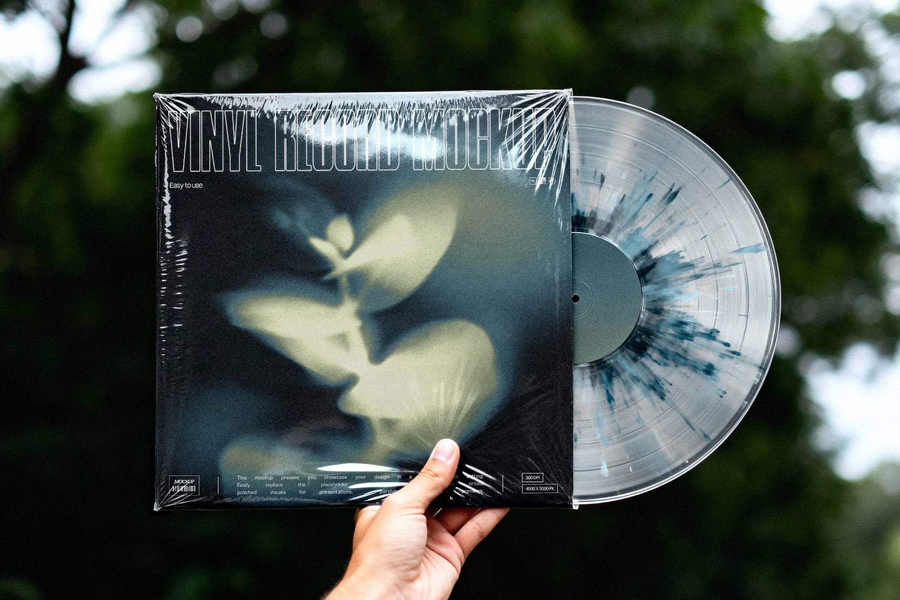 Hand Holding Vinyl Record Mockup