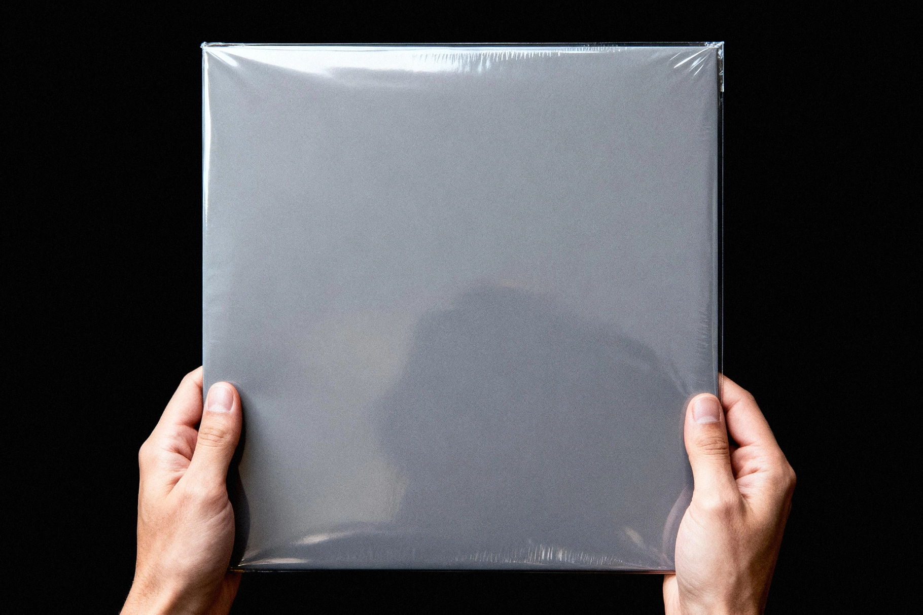 Hands Holding Vinyl Record Cover Mockup