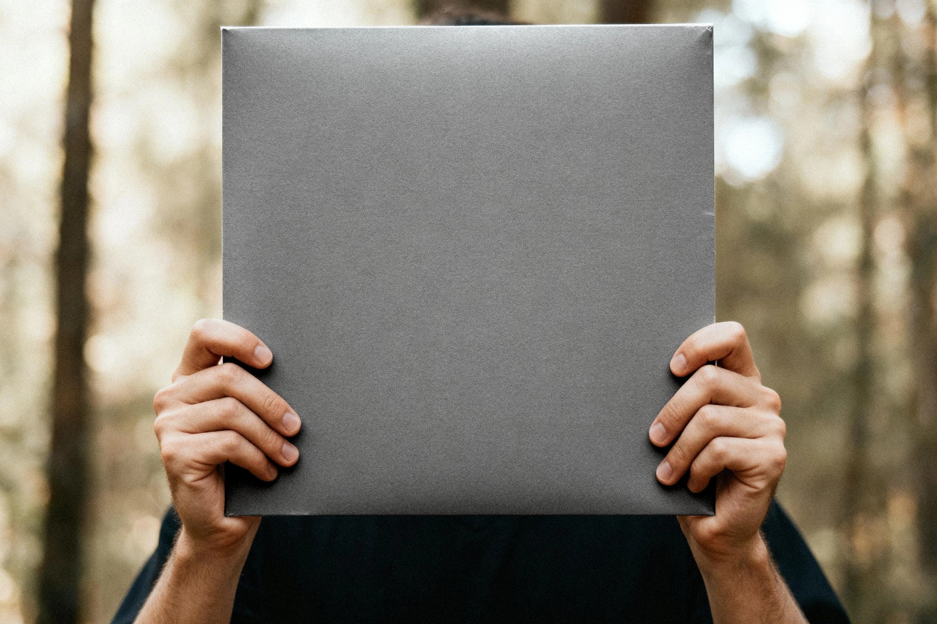 Handheld Vinyl Record Cover Mockup