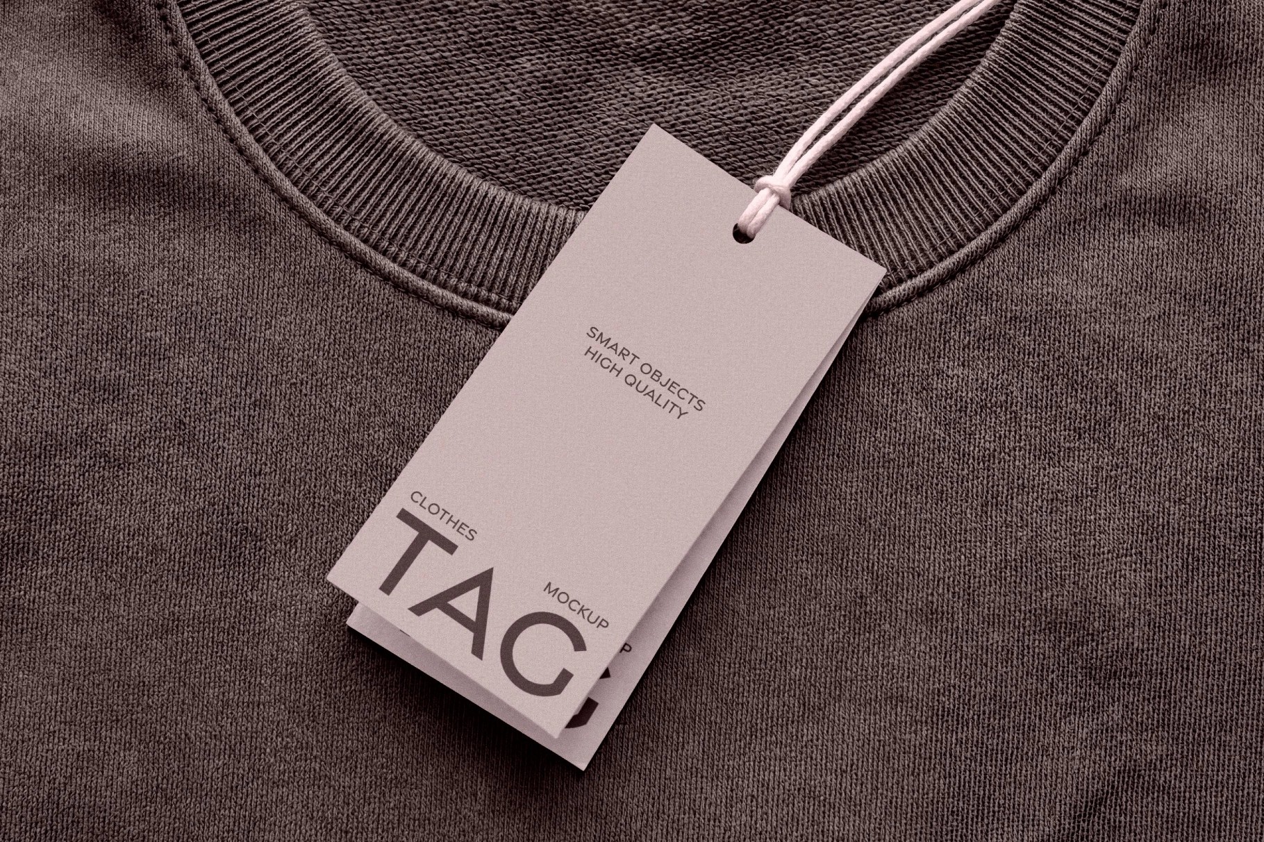 Clothing Tag Mockup on Sweatshirt Fabric