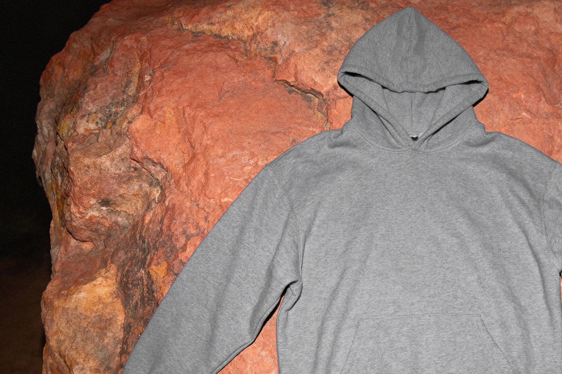 Hoodie Mockup on Natural Stone Surface
