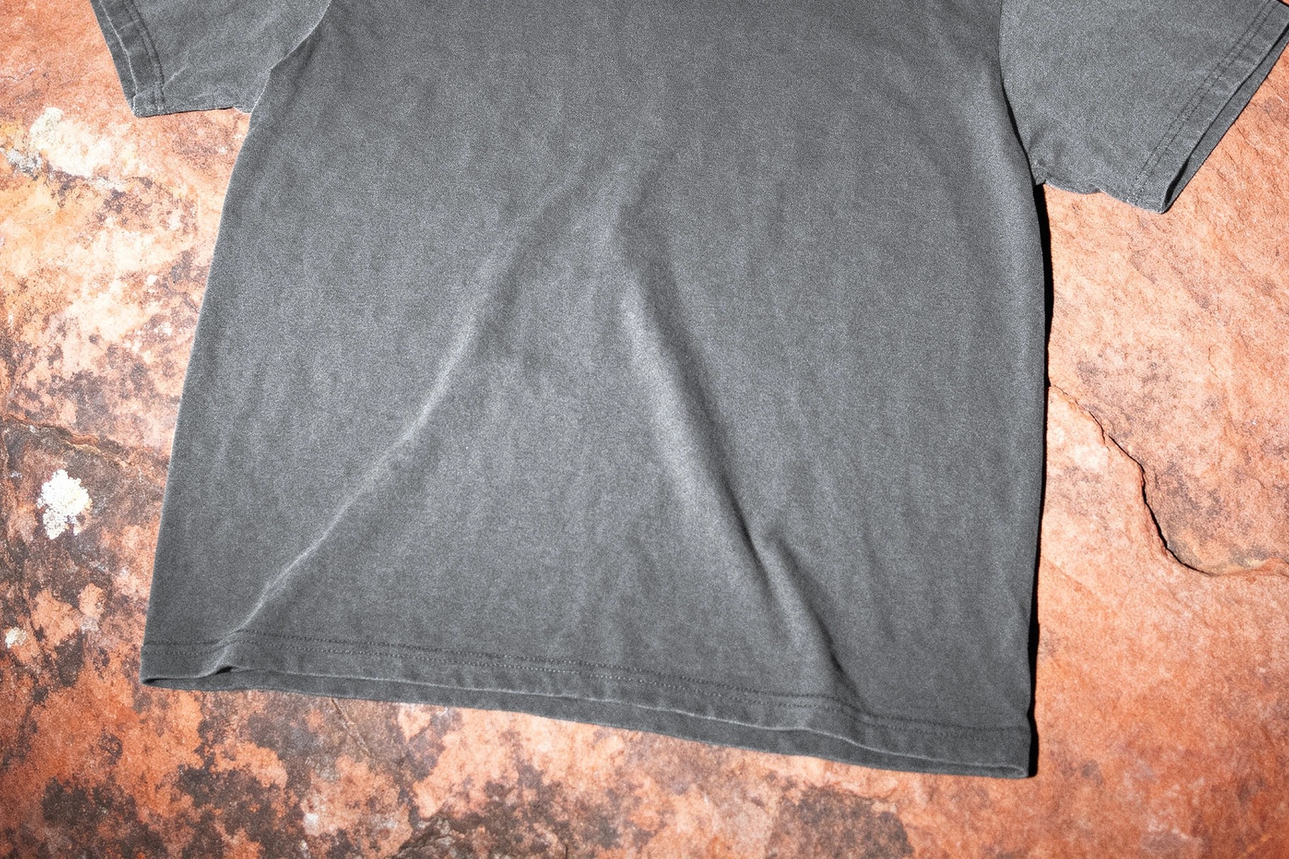 T-Shirt Mockup on Rock Close-Up View