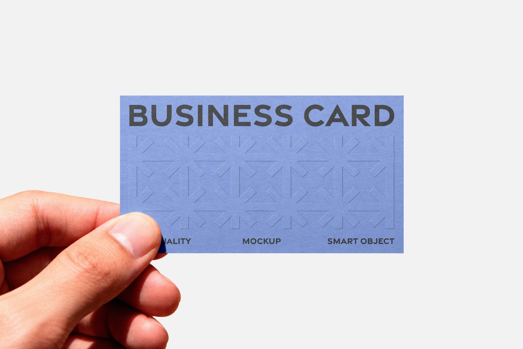 Embossed Business Card Mockup in Hand