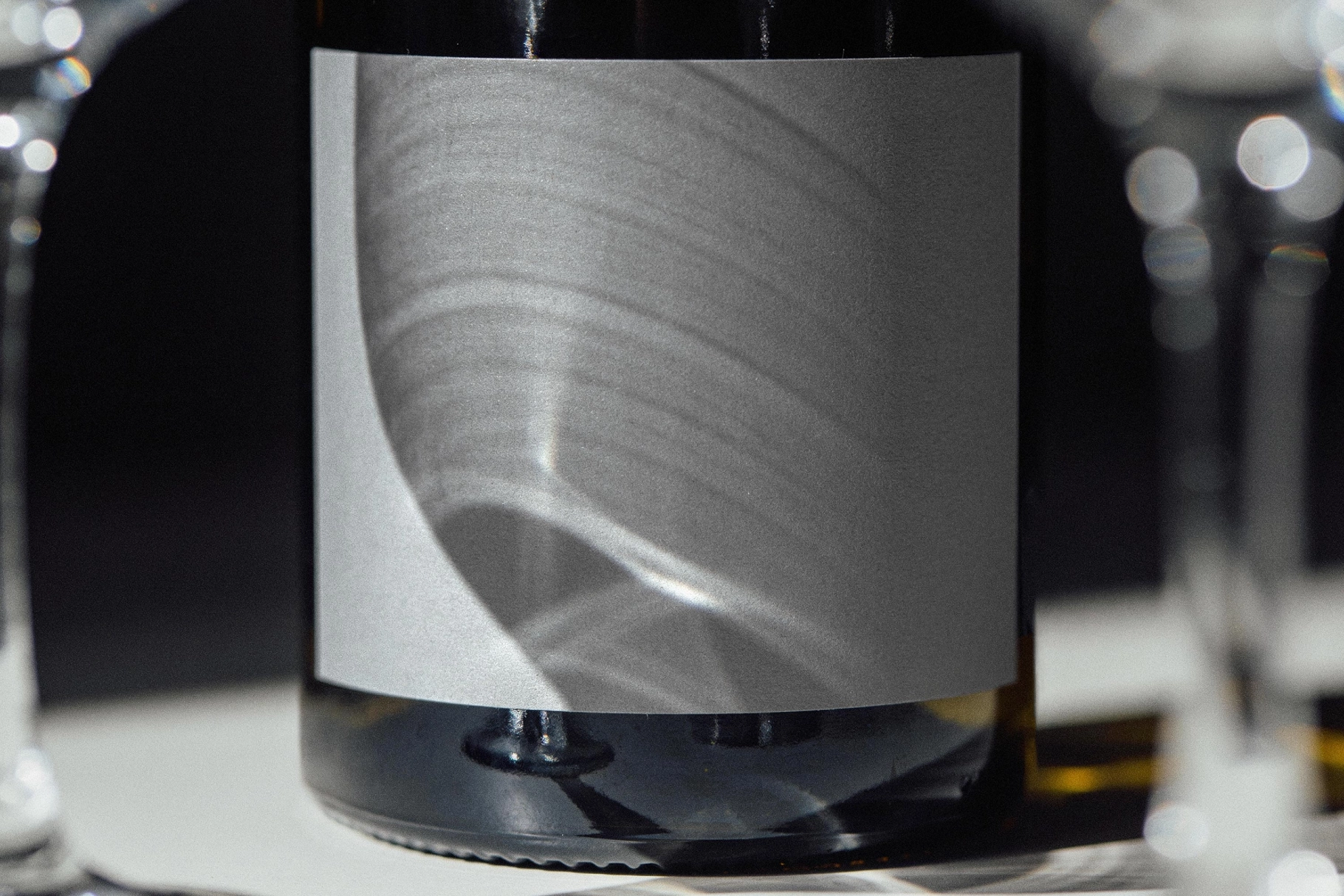Wine Bottle Mockup with Glasses Closeup