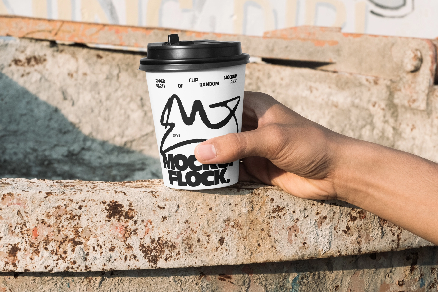 Hand-Held Coffee Cup Mockup