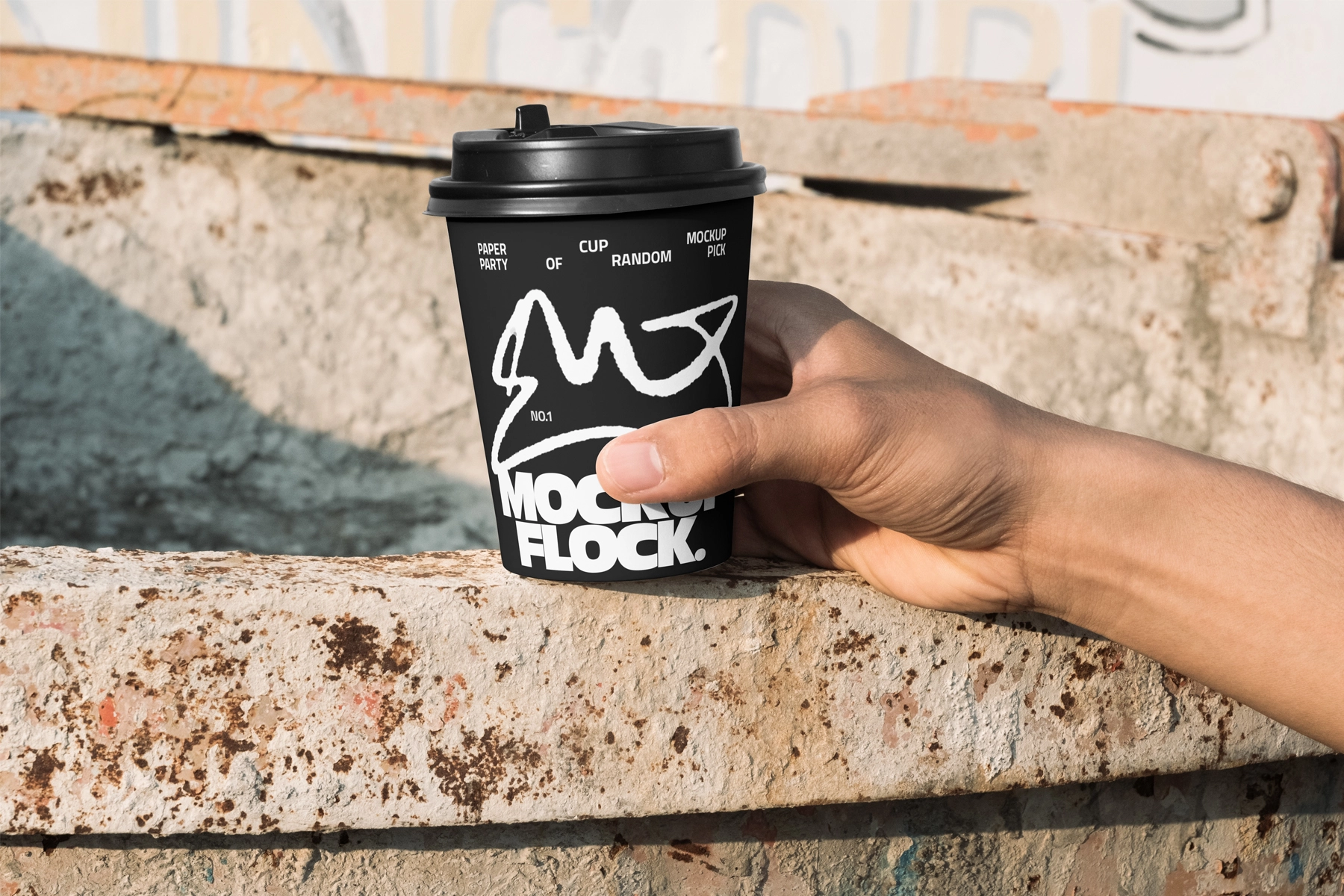 Hand-Held Coffee Cup Mockup