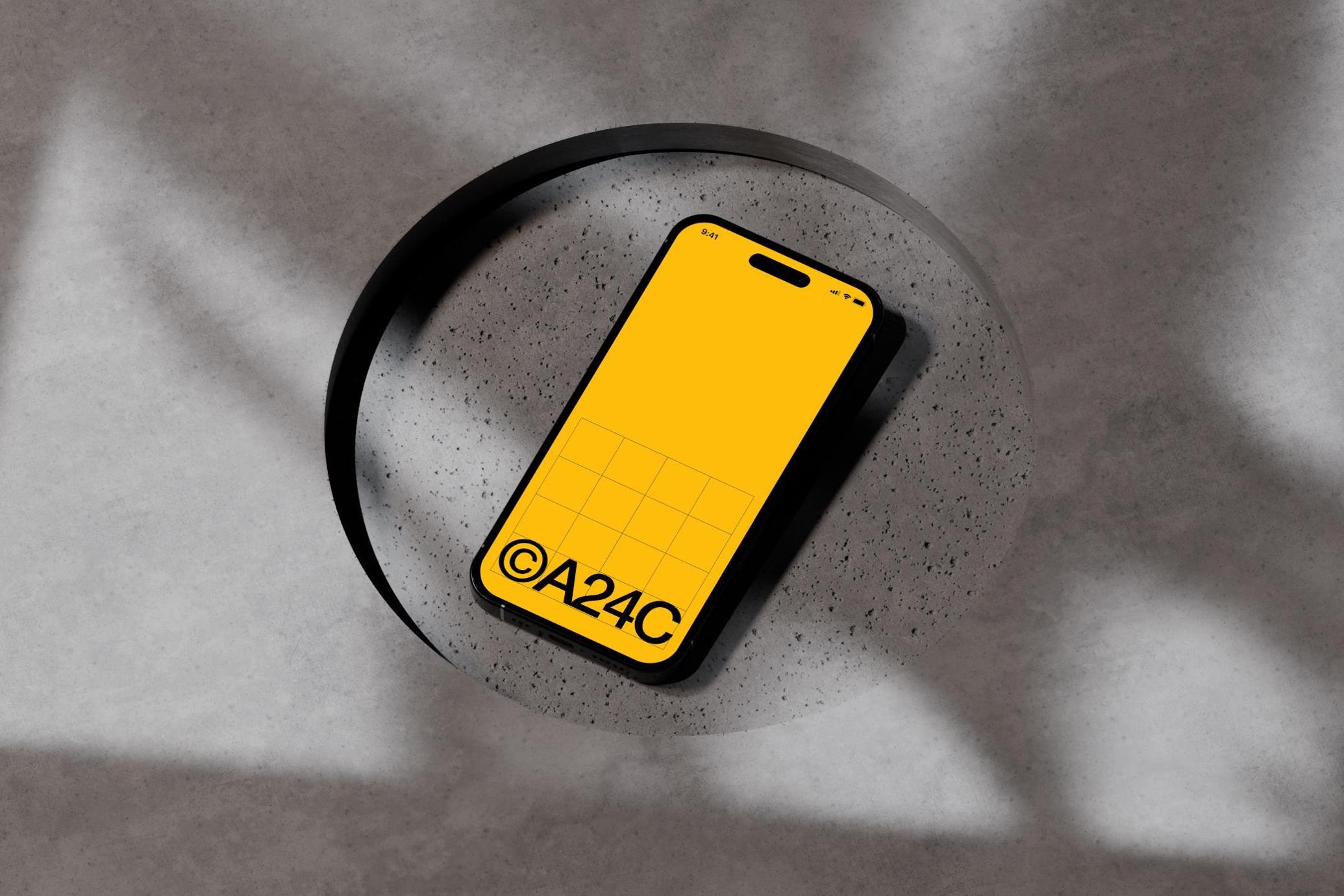iPhone 16 Mockup on Concrete